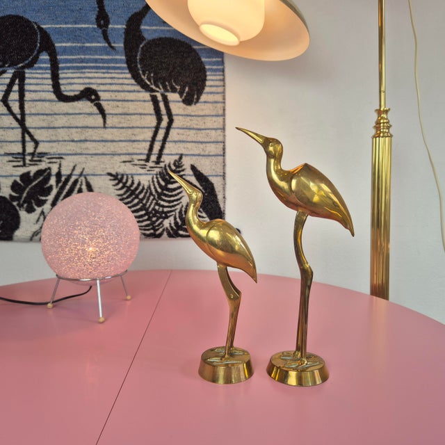 Dimensions: Height: 26 cm and 31 cm Condition: Very good Elegant pair of brass deer sculptures distinguished by their...
