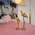 Dimensions: Height: 26 cm and 31 cm Condition: Very good Elegant pair of brass deer sculptures distinguished by their...