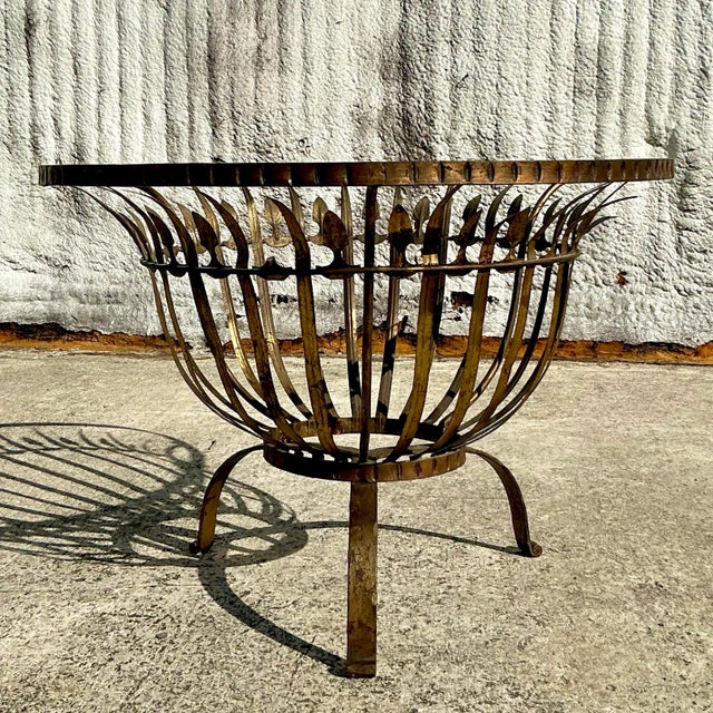 Introduce timeless elegance to your home with this vintage Regency Ferrocolor Spain gilt table. Crafted with exquisite...