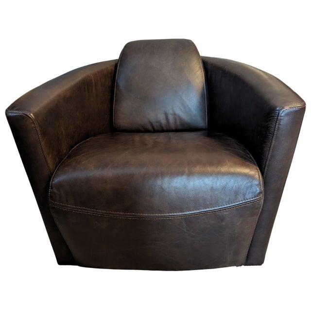 This Restoration Hardware low-slung seat recalls the cockpit of an early 20th-century vintage fighter plane. Clad in...
