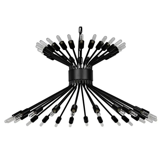 This spectacular, sculptural 48 bulb chandelier has been artisan crafted of matte black metal. Industrial, edgy, and...