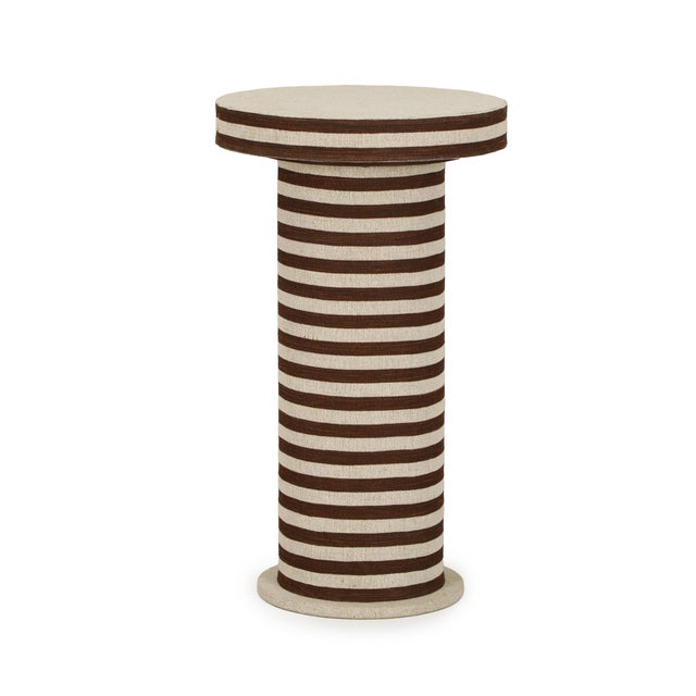 The Lyra Table Collection brings a fresh, natural touch to living spaces or hospitality settings. Striped cotton jute adds...