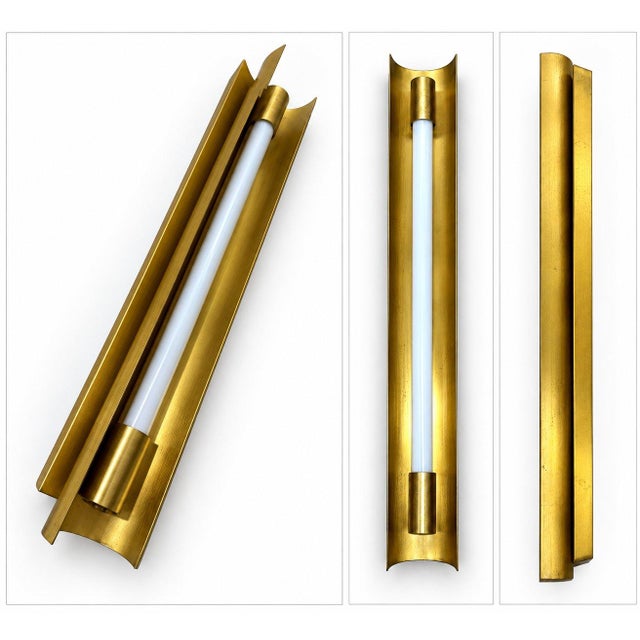 A Mid-Century Modern / Italian Modernist / Minimalist wall sconce, inspired by 1950s–1970s design. Its clean geometry,...