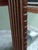 It's a wall mirror by Robert Stern and Turner Manufacturing Co. It is 1940s/1950s Mid-Century.