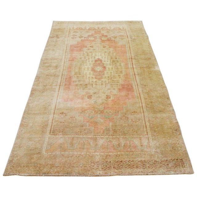 Hand-knotted with care using traditional rug-making techniques, this wool rug blends timeless craftsmanship with a modern...