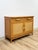 This vintage rattan and wicker cane buffet brings an easy, coastal sensibility to any dining room or living space,...