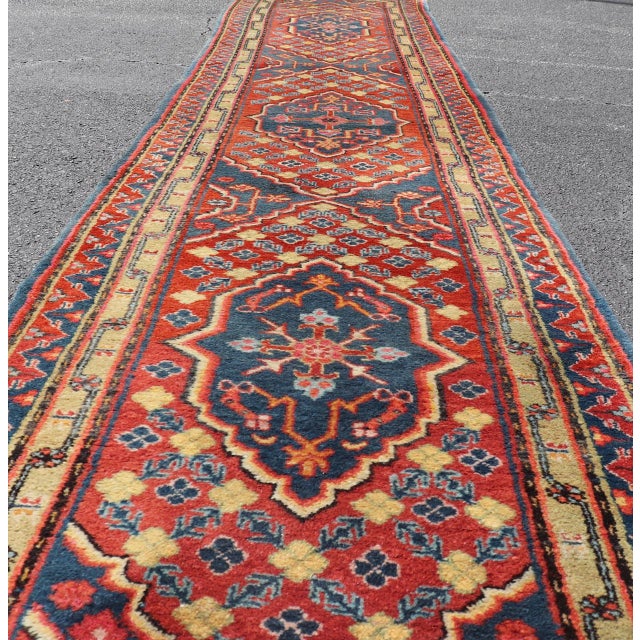Textile Antique Khotan Runner in Deep Indigo, Rust Red, and Soft Yellow Tones For Sale - Image 7 of 14