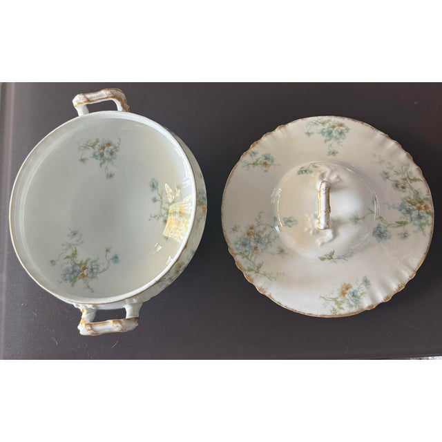 A beautiful antique Theodore Haviland Limoges lidded tureen dating to 1893–1905. This elegant round covered serving dish...