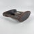 Ethiopian headrests come in various forms. They range from simple to elaborately carved artifacts. They have abstract...