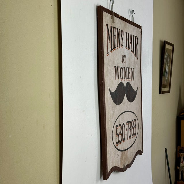 A very beautiful and unique vintage double sided sign, adverting "Mens Hair by Women". A large mustache takes the charm to...