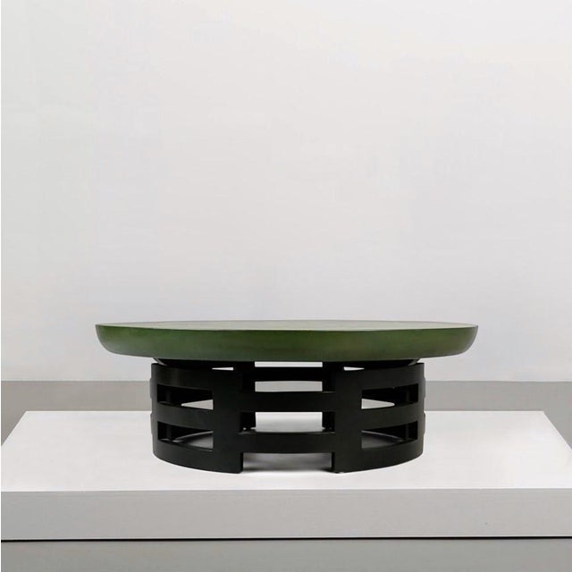 Truly stunning piece with grandeur and beauty! This bold coffee or cocktail table by the award winning designers Theodore...