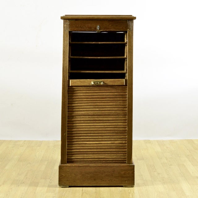This office desk represents a classic example of functional period furniture, ideal for lovers of modern antiques and...