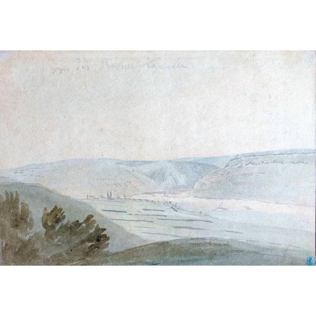 High quality watercolor drawing on paper representing a landscape. Faded handwritten text on top of sheet, not readable....