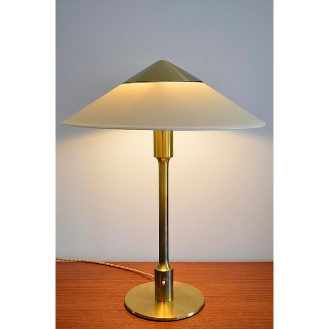 This impressive table lamp was designed by Niels Rasmussen Thykier in the 1950s for Fog & Mørup in Denmark. This lamp has...