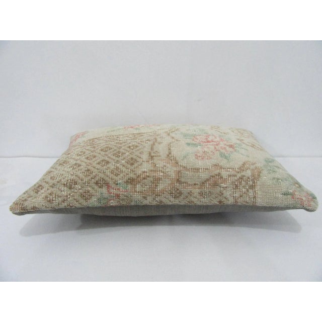 Decorative pillow cover made from a vintage Turkish handknotted rug. Backed with good quality cotton fabric. Pillow...