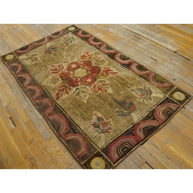 Antique American Hooked Rug, Size:3' 2"x 5' 6" Antique American Hooked Ivory 1900s Rug, Circa Date: 1900s. This charming...