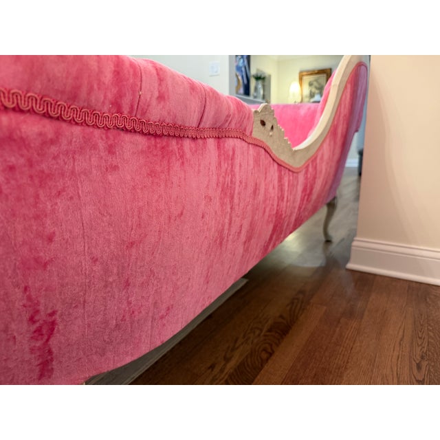 An extraordinary, matching mirror-image pair of mid-to-late 20th-century French Rococo style chaise lounges. The true pair...