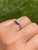 The Gladstone Place Duo: White Gold Promise Ring set with Natural Diamonds. This contemporary ring features a central...