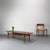 Long, gently rounded tabletop with a practical magazine shelf. Lane furniture is a classic in the USA, but quite rare...