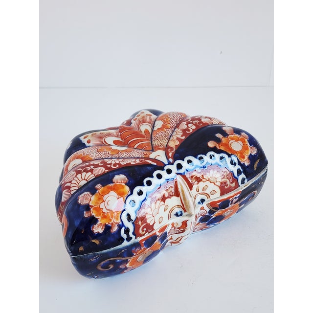 Antique Meiji Period Japanese imari porcelain box shaped in a form of a butterfly. The decorative lidded box features...