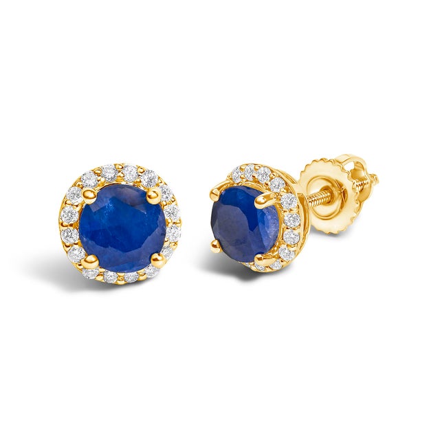 Immerse yourself in the allure of these exquisite 10K yellow gold stud earrings, each centered with a captivating 5mm...