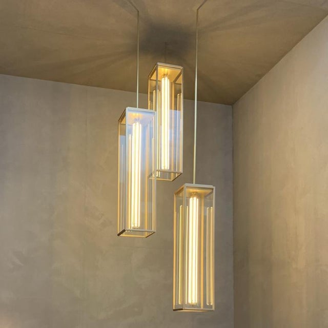 Pendant light in dark bronze with inside fitted clear glass, closed top. With fixed tube and ceiling plate (to be ordered...