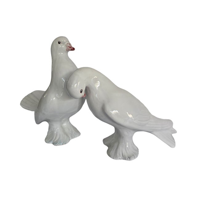 Pair of creamy white birds, beautifully proportioned to nestle together. amorphous wonderful symbol of love.