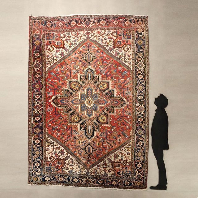 Heriz rug in cotton and wool, large knot, hand-made. This piece is attributed to the mentioned designer/maker. It has no...
