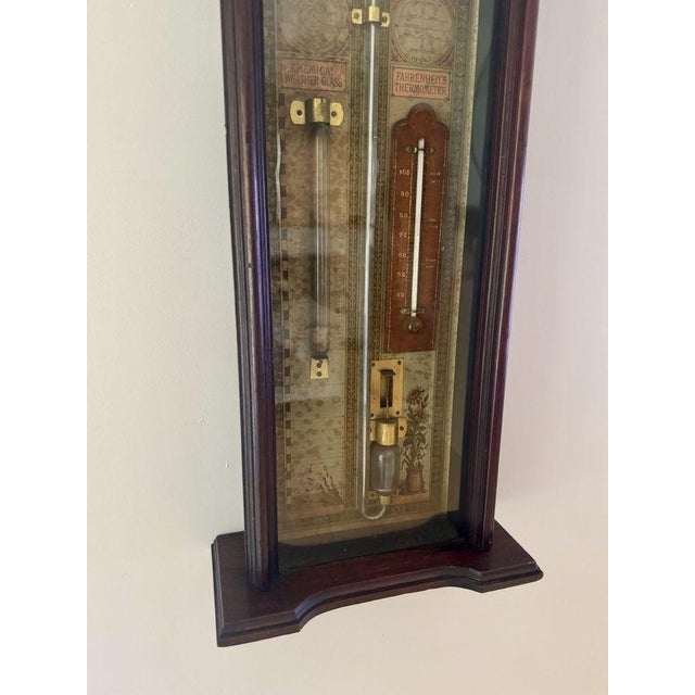 Unusual antique Edwardian mahogany Admiral Fitzroy barometer and clock, having a quality antique Edwardian clock barometer...