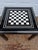 Absolutely charming vintage mid to late twentieth century black lacquered game table with chess/checkers board and...