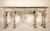 Louis XIV style grisaille painted console table with a Belgium marble top, circa 1920's. With a rectangular Belgium marble...