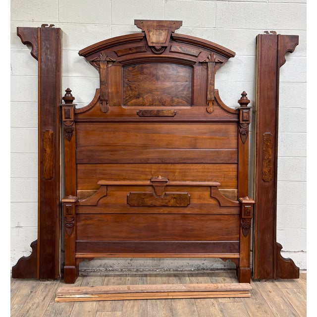 This is an absolutely stunning antique high back Victorian Monumental Eastlake Full sized carved bed, believed to be from...
