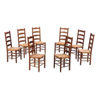 French Oak and Rush Dining Chairs in the Manner of Charlotte Perriand, Circa 1950 - Set of 8 For Sale