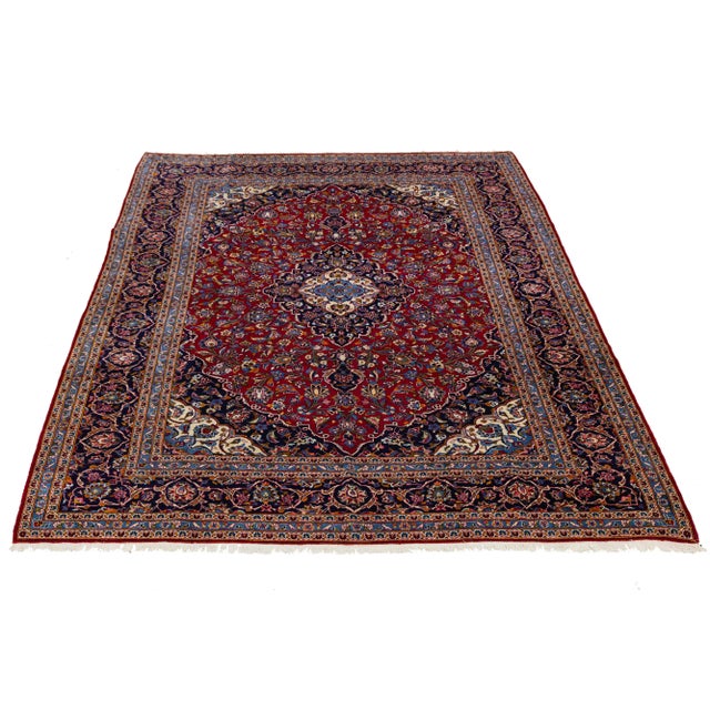Elevate your space with this exquisite Persian-style area rug, a true masterpiece of traditional craftsmanship and...