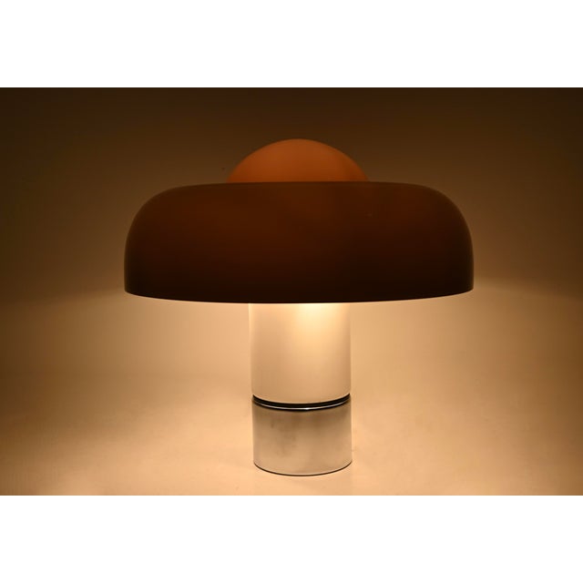 Plastic and metal lamp by Luigi Massoni, Brumbury model. Double switch to choose to illuminate part or all of the lamp....