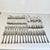 Vintage Home is pleased to offer this 1970s Vintage set of Silver Plate Flatware. It features a lovely flared tip end. We...