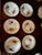 A set of six elegant dessert plates from the renowned Royal Worcester "Evesham Vale" pattern. Crafted in fine porcelain,...