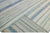 Beautiful Moroccan style handmade wool rug with an ivory and blue field. This Modern rug features a gorgeous all-over...