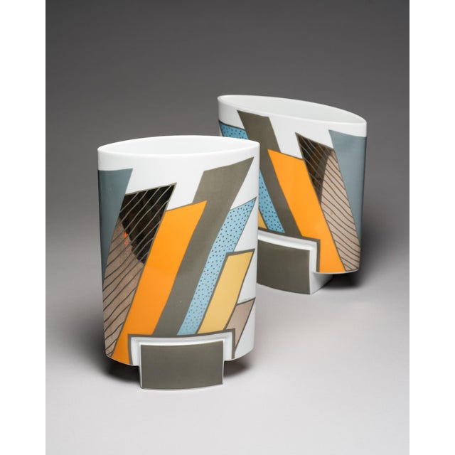 Pair of “debut” porcelain vases produced by rosenthal studio-line in 1991 and 1993. Michael boehm designed the flattened...