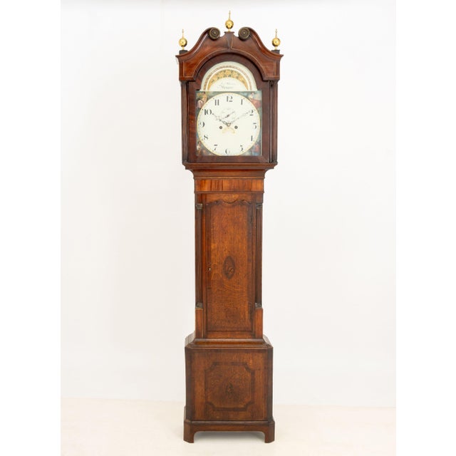 George IV Mahogany and Oak Longcase Clock, by Joseph Whiston, Newport, circa 1825, the painted dial with calendar and...