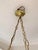 Elegant French Art Deco chandelier from the 1930s, featuring a large frosted pressed-molded glass bowl adorned with a deep...