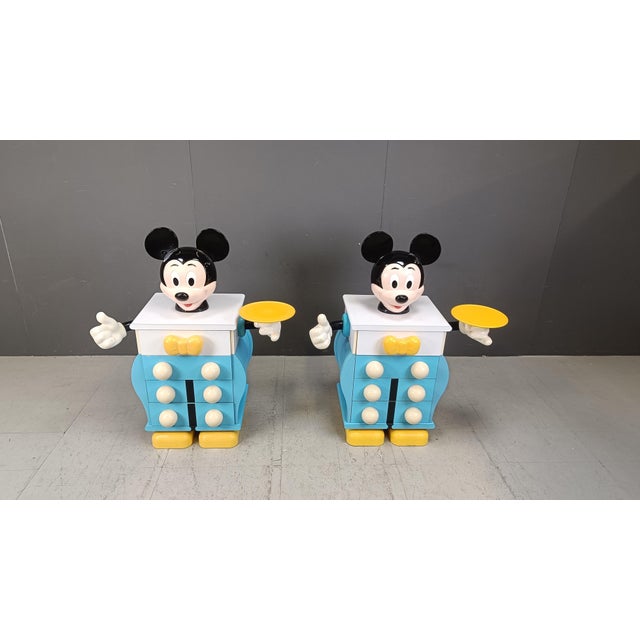 Pair of rare Mickey Mouse bedside cabinets designed by Pierre Colleu. Made of laminated wood, plastics, and resins. Very...