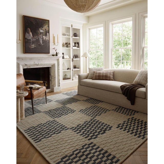 The Bradley Collection from Chris Loves Julia x Loloi takes the classic striped rug to new heights. This hand-tufted, 100%...