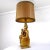 This eye catching floor or table lamp in Mayan style truly is an impressive piece. Its foot is a large ceramic statue of a...