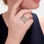 A fine signed Finnish Modernist ring. By Lapponia. In sterling silver. With a textured front and thick, tapering shank....