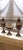 Elevate your home decor with this luxurious 3-piece French-style porcelain urn and centerpiece set. Designed to evoke the...