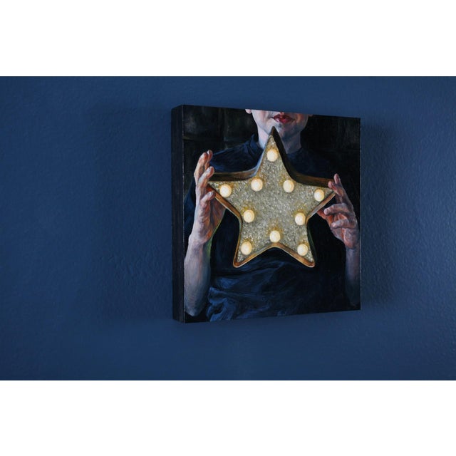 The Star in my hands by Marianna Foster | Oil on Board Portrait of a person holding a star-shaped light. For Sale - Image 4 of 5