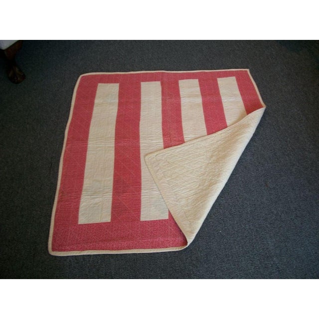 19th century Pennsylvania bar crib quilt is from Lancaster county, Pennsylvania and is treadle machine stitched. The...