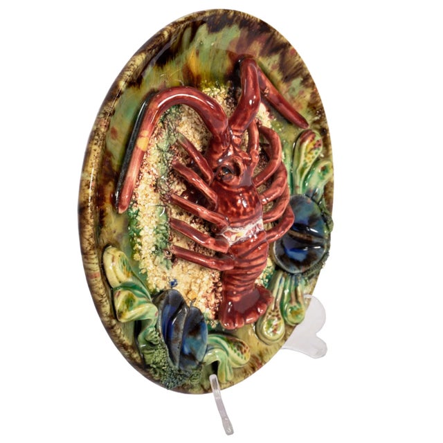 A good antique Palissy Ware style Portuguese majolica wall plate, circa 1900. The plate decorated with a large lobster to...
