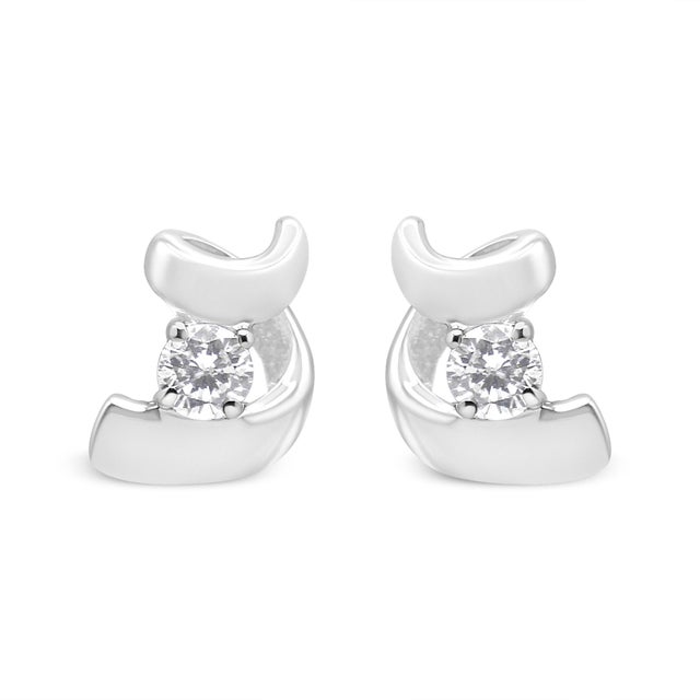 Add an instant glow to your look with these stunning diamond earrings. Designed with elegance, the earrings are made using...